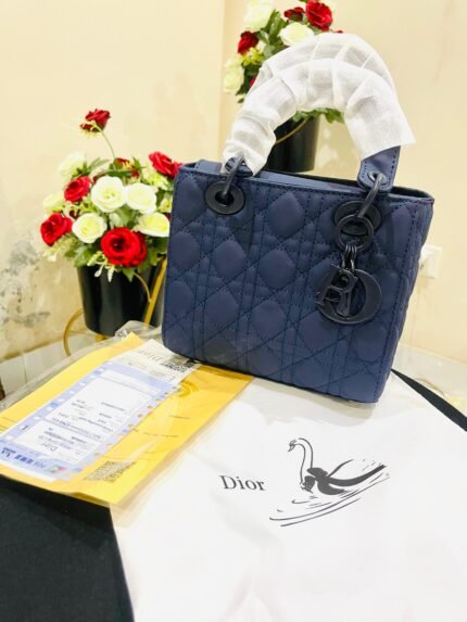 blue dior hand bag